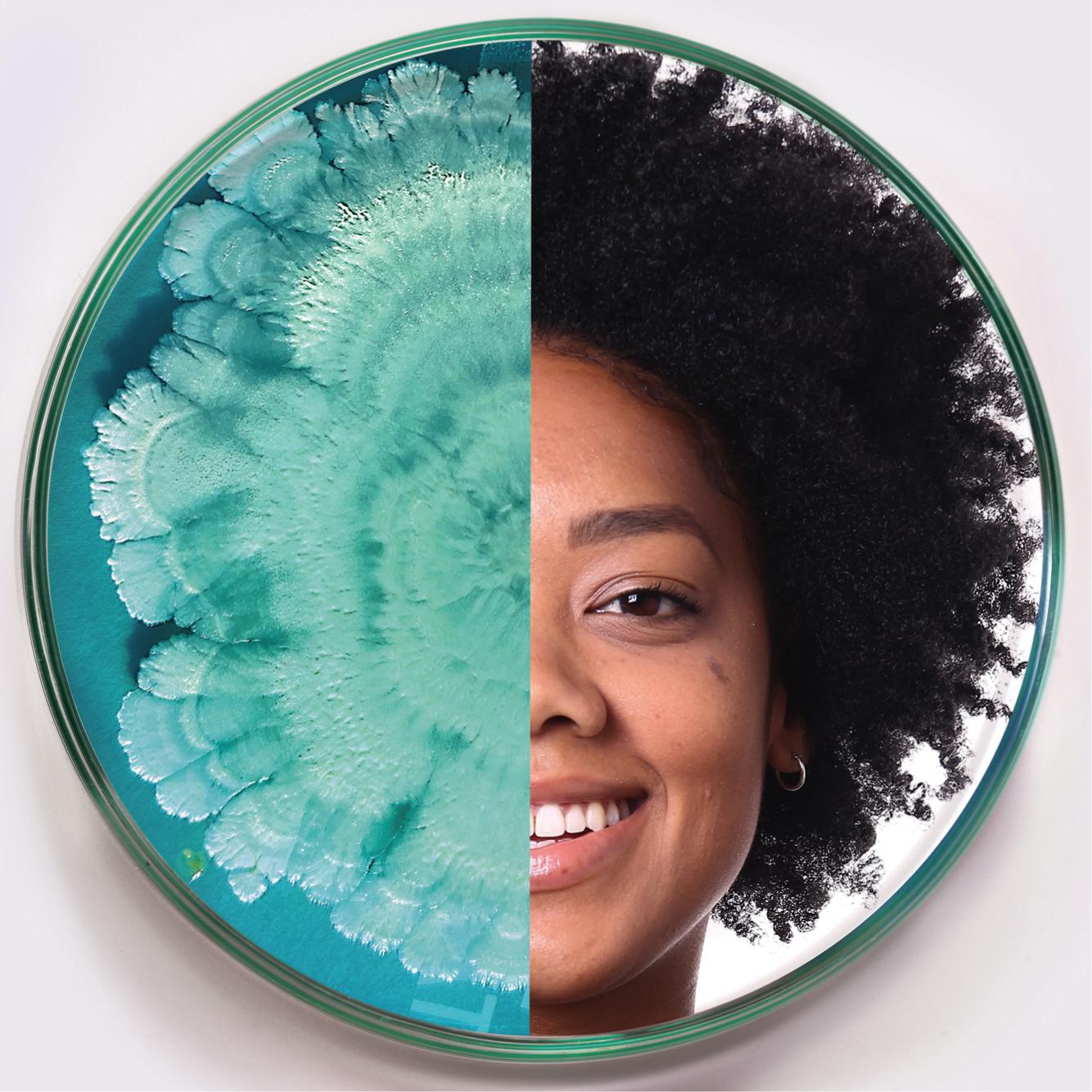 A round image split in half: one side shows a turquoise bacterial culture in a petri dish; the other side shows a smiling woman’s face with curly hair, both sides blending seamlessly together.