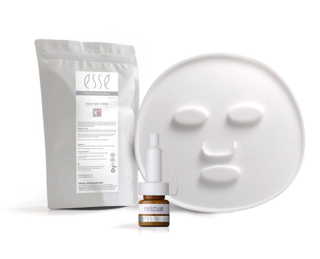 Esse Professional skincare products, including a white pouch labeled "aqua gel mask," a small bottle labeled "rescue," and a white molded face mask, are displayed on a white background.